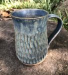 blue carved mug